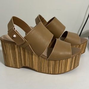 Nude platform heels.